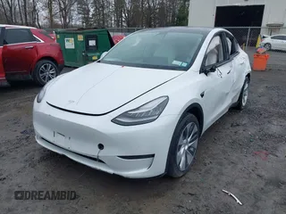 2020 Tesla Model Y Long Range with VIN 5YJYGDEE4LF044843, listed as a IAAI auction lot 41799504 with 40,770 mi miles and . Bid and sale history available at DreamBid. Image 6.