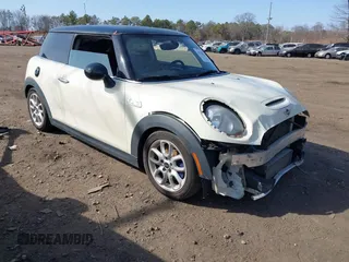 2014 MINI Hardtop S with VIN WMWXM7C57ET987122, listed as a IAAI auction lot 41780127 with 78,567 mi miles and . Bid and sale history available at DreamBid. Image 14.