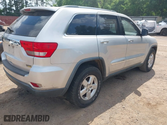 2012 Jeep Grand Cherokee Laredo with VIN 1C4RJEAG4CC251359, listed as a IAAI auction lot 41986762 with 172,331 mi miles. Bid and sale history available at carsss.com. Image 4.