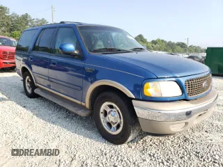 2000 Ford Expedition Eddie Bauer with VIN 1FMRU17L1YLC39371, listed as a Copart auction lot 53982495 with 220,391 mi miles and Salvage title. Bid and sale history available at DreamBid. Image 4.