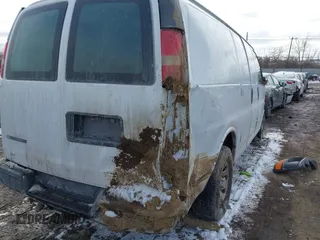 2010 Chevrolet Express Cargo Van with VIN 1GCUGADX6A1154119, listed as a IAAI auction lot 41608254 with 156,816 mi miles. Bid and sale history available at carsss.com. Image 6.