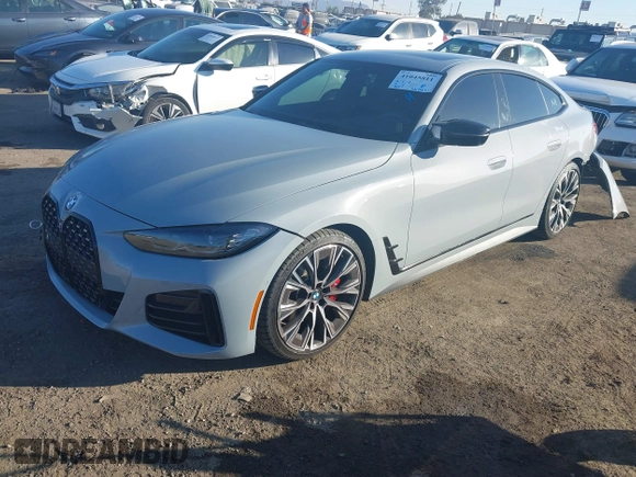 2023 BMW 4 Series M440i with VIN WBA63AW05PFP60184, listed as a IAAI auction lot 41045811 with 12,141 mi miles and . Bid and sale history available at DreamBid. Image 18.