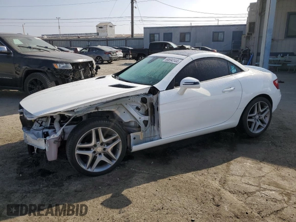 2014 Mercedes-Benz SLK-Class SLK 250 with VIN WDDPK4HA5EF075252, listed as a Copart auction lot 69894144 with 124,204 mi miles and Salvage Title. Bid and sale history available at carsss.com. Image 1.