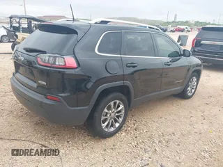 2019 Jeep Cherokee Altitude with VIN 1C4PJLLBXKD280354, listed as a IAAI auction lot 42124578 with 162,289 mi miles and . Bid and sale history available at DreamBid. Image 4.