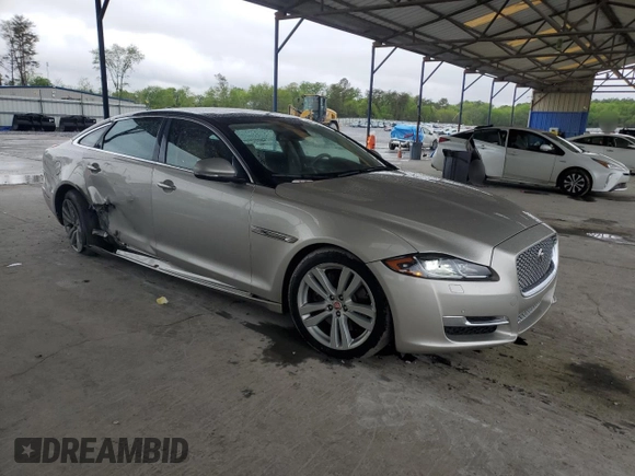 2016 Jaguar XJ Portfolio with VIN SAJWA2G70G8V93006, listed as a Copart auction lot 52324635 with 123,690 mi miles and Salvage Title. Bid and sale history available at DreamBid. Image 4.