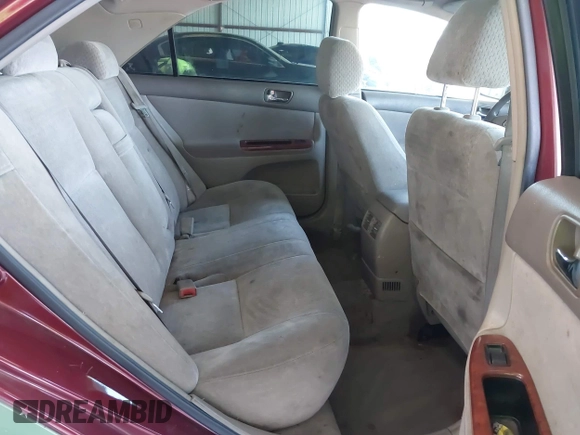 2002 Toyota Camry LE z VIN 4T1BE30K02U096796, wystawiony jako IAAI lot #42230108 z przebiegiem 249 883 mil mil oraz . Historia ofert i sprzedaży dostępna na DreamBid. Obrazek 8.