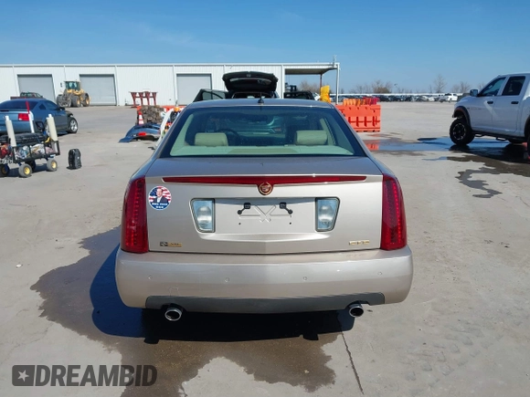 2005 Cadillac STS z VIN 1G6DC67A950171835, wystawiony jako IAAI lot #41599105 z przebiegiem 74 235 mil mil oraz . Historia ofert i sprzedaży dostępna na DreamBid. Obrazek 16.