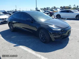 2019 Tesla Model 3 Mid Range with VIN 5YJ3E1EA5KF306816, listed as a IAAI auction lot 41710916 with 76,222 mi miles. Bid and sale history available at carsss.com. Image 1.