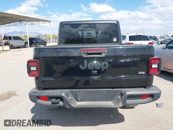 2021 Jeep Gladiator Willys with VIN 1C6HJTAG7ML523718, listed as a IAAI auction lot 42206058 with 48,071 mi miles and . Bid and sale history available at DreamBid. Image 16.