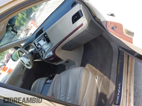 2011 Toyota Sienna XLE AAS with VIN 5TDYK3DC7BS008535, listed as a IAAI auction lot 42589645 with 208,624 mi miles and . Bid and sale history available at DreamBid. Image 5.
