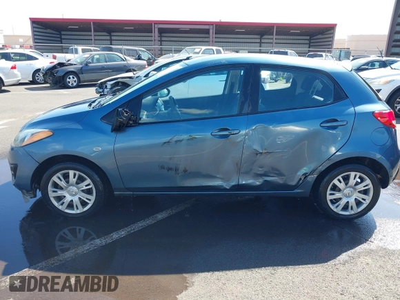 2014 Mazda 2 Sport with VIN JM1DE1KY0E0181555, listed as a IAAI auction lot 41539841 with 121,918 mi miles and . Bid and sale history available at DreamBid. Image 14.