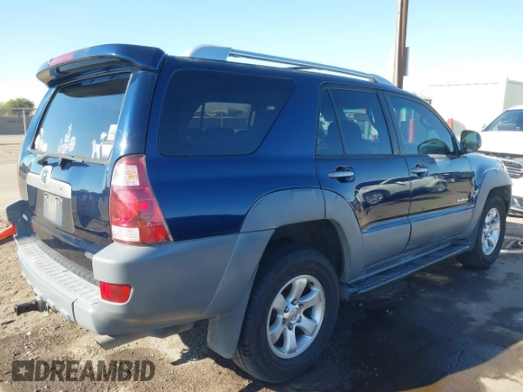 2003 Toyota 4Runner SR5 with VIN JTEZT14R238001097, listed as a IAAI auction lot 41266011 with 180,905 mi miles. Bid and sale history available at carsss.com. Image 4.