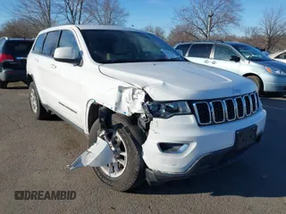 2019 Jeep Grand Cherokee Laredo E with VIN 1C4RJFAG7KC694674, listed as a IAAI auction lot 41591678 with 61,144 mi miles. Bid and sale history available at carsss.com. Image 1.