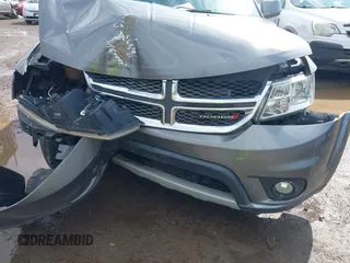 2013 Dodge Journey SXT with VIN 3C4PDCBG6DT506486, listed as a IAAI auction lot 41877271 with 196,597 mi miles and . Bid and sale history available at carsss.com. Image 6.