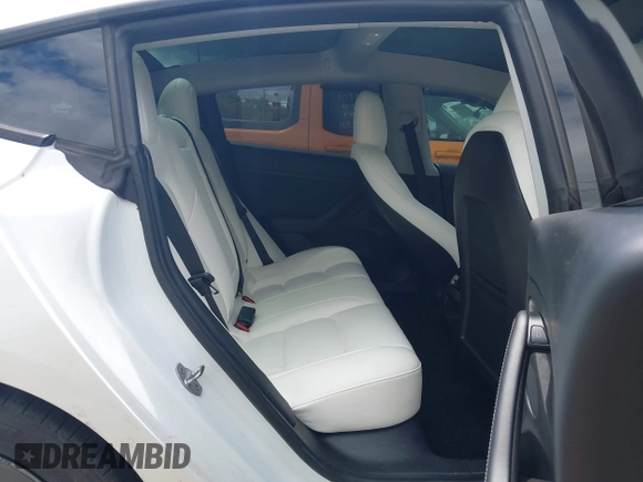 2021 Tesla Model 3 Standard Range Plus z VIN 5YJ3E1EA3MF060027, wystawiony jako IAAI lot #42319107 z przebiegiem 44 339 mil mil oraz . Historia ofert i sprzedaży dostępna na DreamBid. Obrazek 8.