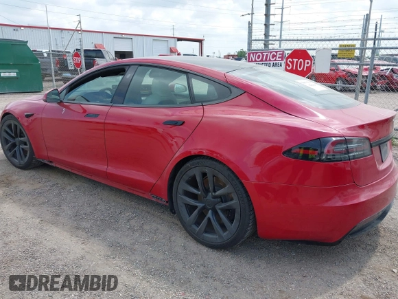 2022 Tesla Model S with VIN 5YJSA1E58NF486727, listed as a IAAI auction lot 42139418 with Not provided miles and . Bid and sale history available at DreamBid. Image 3.