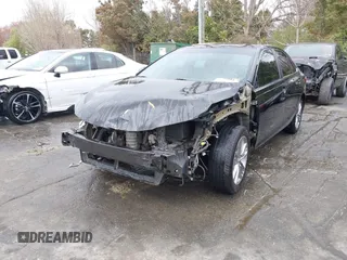 2015 Toyota Camry XLE with VIN 4T1BF1FK9FU114582, listed as a IAAI auction lot 41801187 with 165,199 mi miles. Bid and sale history available at carsss.com. Image 6.