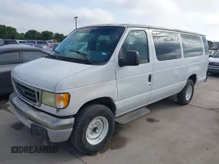 2003 Ford Econoline Passenger XL with VIN 1FDSS31L13HB83911, listed as a IAAI auction lot 42213376 with 236,989 mi miles. Bid and sale history available at carsss.com. Image 2.