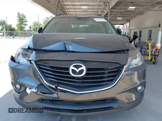 2014 Mazda CX-9 Grand Touring z VIN JM3TB2DA0E0434181, wystawiony jako IAAI lot #42295436 z przebiegiem 78 372 mil mil oraz . Historia ofert i sprzedaży dostępna na DreamBid. Obrazek 12.