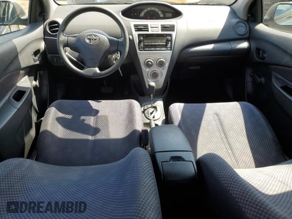 2008 Toyota Yaris with VIN JTDBT923481241884, listed as a Copart auction lot 54702185 with 82,053 mi miles and Salvage Title. Bid and sale history available at DreamBid. Image 8.