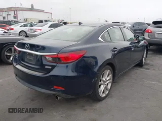 2016 Mazda 6 i Touring z VIN JM1GJ1V50G1401865, wystawiony jako IAAI lot #42334286 z przebiegiem 148 593 mil mil oraz . Historia ofert i sprzedaży dostępna na DreamBid. Obrazek 4.