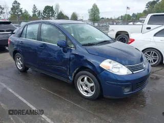 2007 Nissan Versa 1.8 SL with VIN 3N1BC11E67L420474, listed as a IAAI auction lot 41887735 with 199,094 mi miles. Bid and sale history available at carsss.com. Image 1.