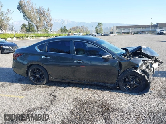 2015 Nissan Altima 2.5 S with VIN 1N4AL3APXFC437185, listed as a IAAI auction lot 41970221 with 134,141 mi miles and . Bid and sale history available at carsss.com. Image 14.