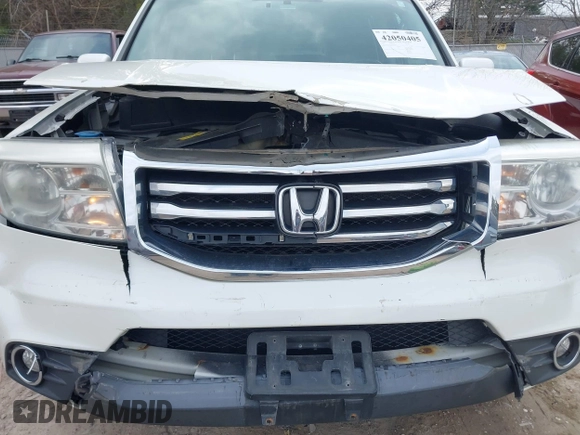 2014 Honda Pilot Touring with VIN 5FNYF4H91EB041614, listed as a IAAI auction lot 42050405 with 158,236 mi miles and . Bid and sale history available at DreamBid. Image 6.