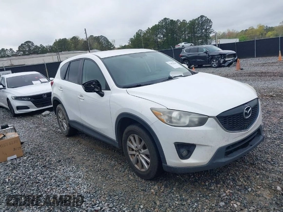 2015 Mazda CX-5 Touring with VIN JM3KE2CY4F0436664, listed as a IAAI auction lot 41876238 with 374,305 mi miles. Bid and sale history available at carsss.com. Image 1.
