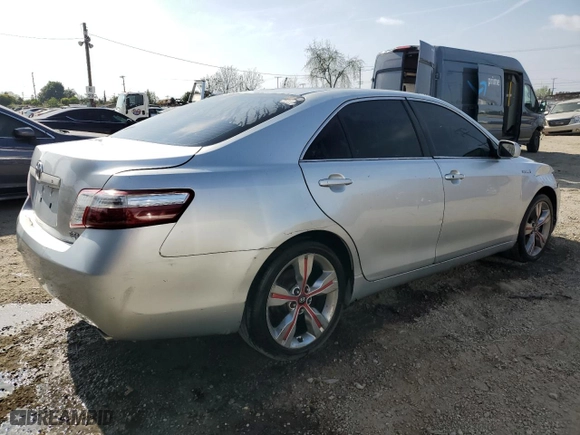 2007 Toyota Camry Hybrid with VIN JTNBB46K073036990, listed as a Copart auction lot 54250035 with 198,952 mi miles and Clean Title. Bid and sale history available at carsss.com. Image 3.