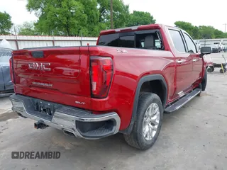 2021 GMC Sierra 1500 SLT z VIN 3GTU9DED2MG153183, wystawiony jako IAAI lot #41880942 z przebiegiem 84 686 mil mil oraz . Historia ofert i sprzedaży dostępna na DreamBid. Obrazek 4.