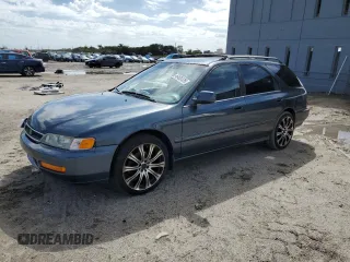 1997 Honda Accord LX with VIN 1HGCE1820VA006099, listed as a Copart auction lot 46405525 with 210,761 mi miles and Salvage Title. Bid and sale history available at carsss.com. Image 1.