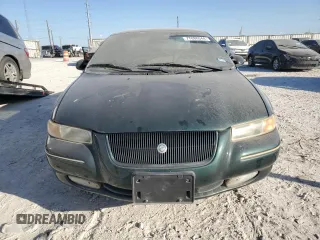 1998 Chrysler Cirrus LXi z VIN 1C3EJ56H2WN272336, wystawiony jako Copart lot #77888044 z przebiegiem 64 757 mil mil oraz Tytuł czysty. Historia ofert i sprzedaży dostępna na DreamBid. Obrazek 5.