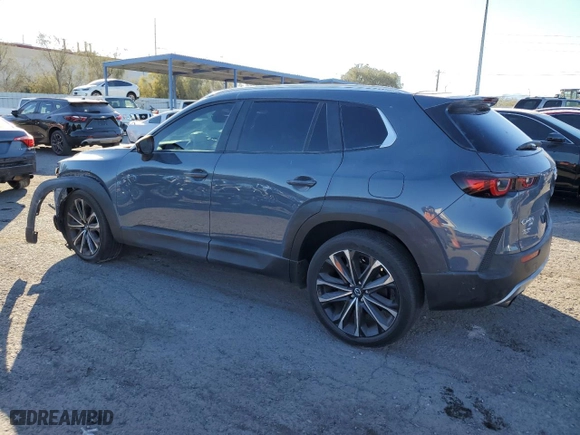 2023 Mazda CX-50 2.5 Turbo with VIN 7MMVABXY1PN139996, listed as a Copart auction lot 85323634 with 21,852 mi miles and Salvage Title. Bid and sale history available at carsss.com. Image 2.