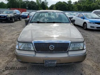 2005 Mercury Grand Marquis LS Premium z VIN 2MEFM75W65X609038, wystawiony jako Copart lot #55766005 z przebiegiem 132 136 mil mil oraz Szkoda całkowita • Salvage title. Historia ofert i sprzedaży dostępna na DreamBid. Obrazek 5.