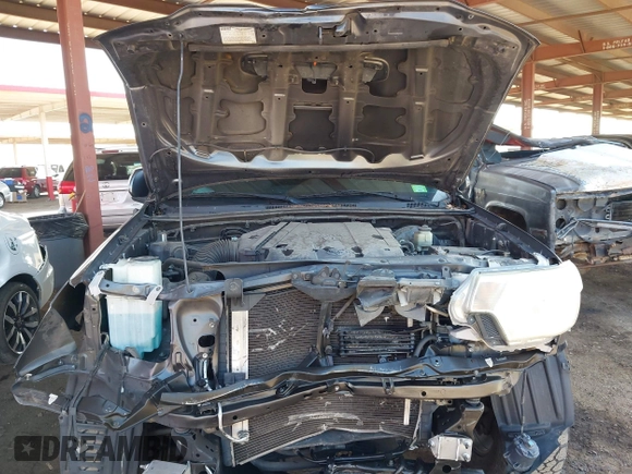 2015 Toyota Tacoma PreRunner with VIN 3TMKU4HN0FM046941, listed as a IAAI auction lot 42533553 with 123,115 mi miles and . Bid and sale history available at DreamBid. Image 10.