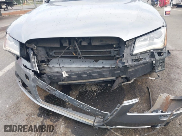 2011 Audi A8 with VIN WAUAVAFD0BN018197, listed as a IAAI auction lot 42221435 with 74,465 mi miles and . Bid and sale history available at DreamBid. Image 6.