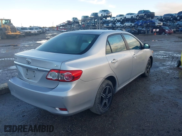 2013 Toyota Corolla L with VIN 5YFBU4EE1DP175281, listed as a IAAI auction lot 41395504 with 180,017 mi miles. Bid and sale history available at carsss.com. Image 4.