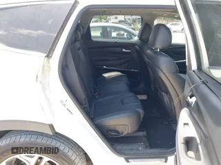 2019 Hyundai Santa Fe Limited z VIN 5NMS5CAA1KH136238, wystawiony jako IAAI lot #42314285 z przebiegiem 74 606 mil mil oraz . Historia ofert i sprzedaży dostępna na DreamBid. Obrazek 8.