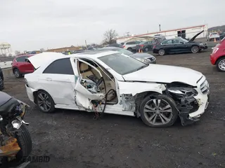 2016 Mercedes-Benz E-Class E 350 Sport with VIN WDDHF5KB6GB237450, listed as a IAAI auction lot 41297976 with 60,573 mi miles. Bid and sale history available at carsss.com. Image 13.