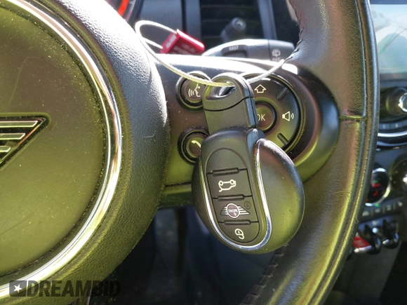 2020 MINI Hardtop 4 Door Cooper with VIN WMWXU7C06L2M63032, listed as a IAAI auction lot 42572567 with 86,220 mi miles and . Bid and sale history available at DreamBid. Image 11.