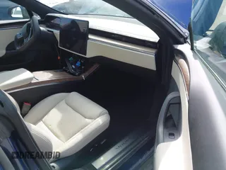 2021 Tesla Model S Long Range with VIN 5YJSA1E51MF442874, listed as a IAAI auction lot 39406495 with 36,127 mi miles and . Bid and sale history available at DreamBid. Image 5.