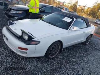1993 Toyota Celica z VIN JT5ST87K6P0145748, wystawiony jako IAAI lot #41401540 z przebiegiem 165 469 mil mil oraz . Historia ofert i sprzedaży dostępna na DreamBid. Obrazek 2.