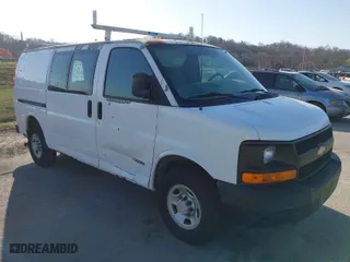 2005 Chevrolet Express Cargo Van with VIN 1GCHG35U651234446, listed as a IAAI auction lot 41803831 with 303,161 mi miles. Bid and sale history available at carsss.com. Image 1.