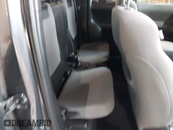 2020 Toyota Tacoma SR with VIN 3TYRX5GN5LT005461, listed as a IAAI auction lot 42020692 with 71,548 mi miles and . Bid and sale history available at DreamBid. Image 8.