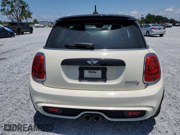2015 MINI Hardtop S z VIN WMWXP7C57F2A42463, wystawiony jako Copart lot #56651155 z przebiegiem 66 710 mil mil oraz Szkoda całkowita • Salvage title. Historia ofert i sprzedaży dostępna na DreamBid. Obrazek 6.