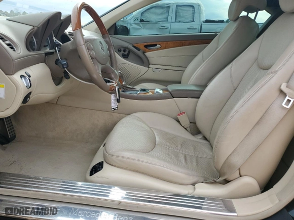2007 Mercedes-Benz SL-Class 5.5L V8 with VIN WDBSK71F57F130540, listed as a Copart auction lot 43042515 with 82,744 mi miles and Salvage Title. Bid and sale history available at carsss.com. Image 7.