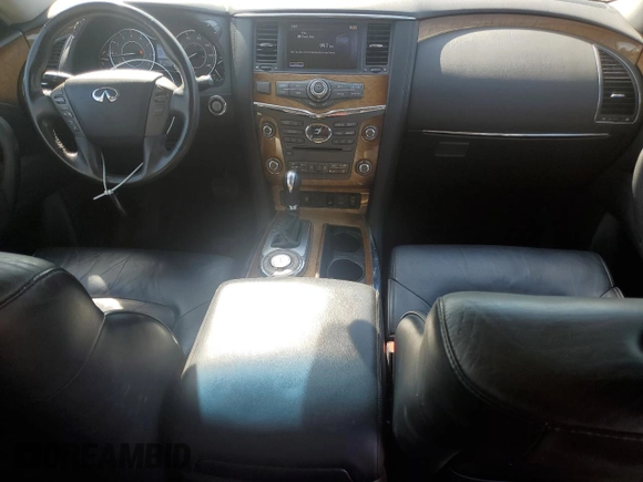 2012 Infiniti QX56 7-passenger with VIN JN8AZ2NF6C9518895, listed as a Copart auction lot 61084975 with 228,628 mi miles and Salvage title. Bid and sale history available at DreamBid. Image 8.