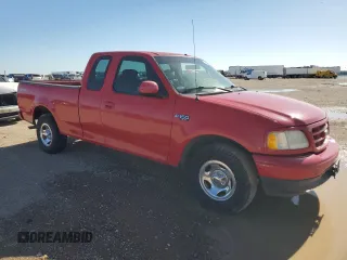 2001 Ford F-150 XL with VIN 1FTZX17211NB16120, listed as a Copart auction lot 54884765 with 124,196 mi miles and Salvage title. Bid and sale history available at DreamBid. Image 4.