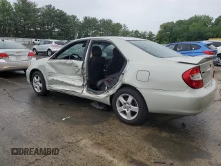 2004 Toyota Camry LE z VIN JTDBE32K940297754, wystawiony jako Copart lot #55809155 z przebiegiem 232 092 mil mil oraz Szkoda całkowita • Salvage title. Historia ofert i sprzedaży dostępna na DreamBid. Obrazek 2.